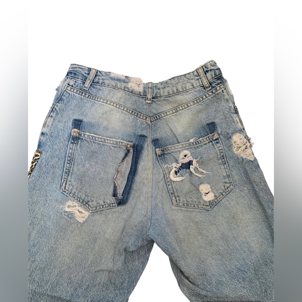 Distressed jean with cheetah down the leg!